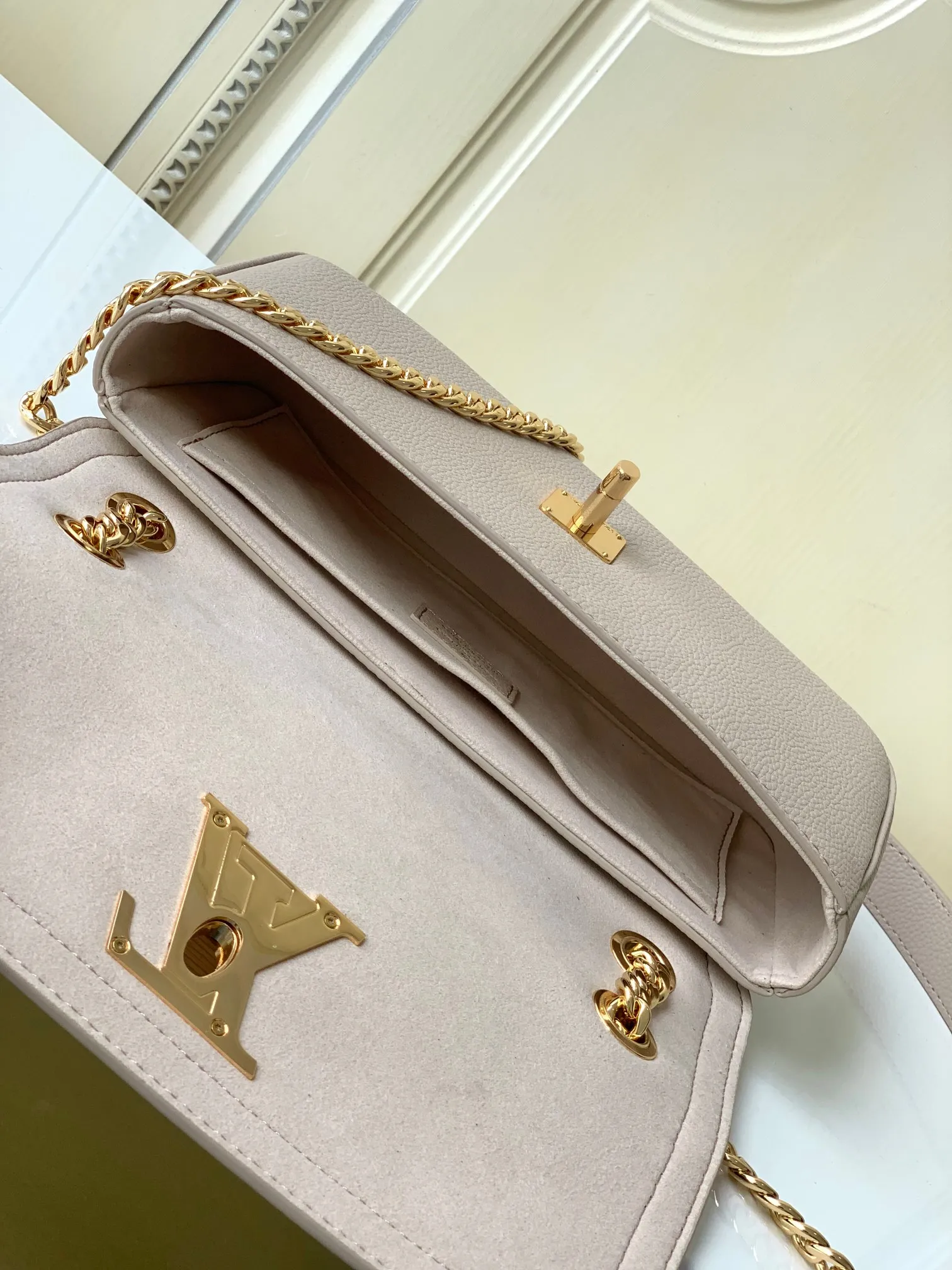 Louis Vuitton LockMe East West M22304 - Image 9