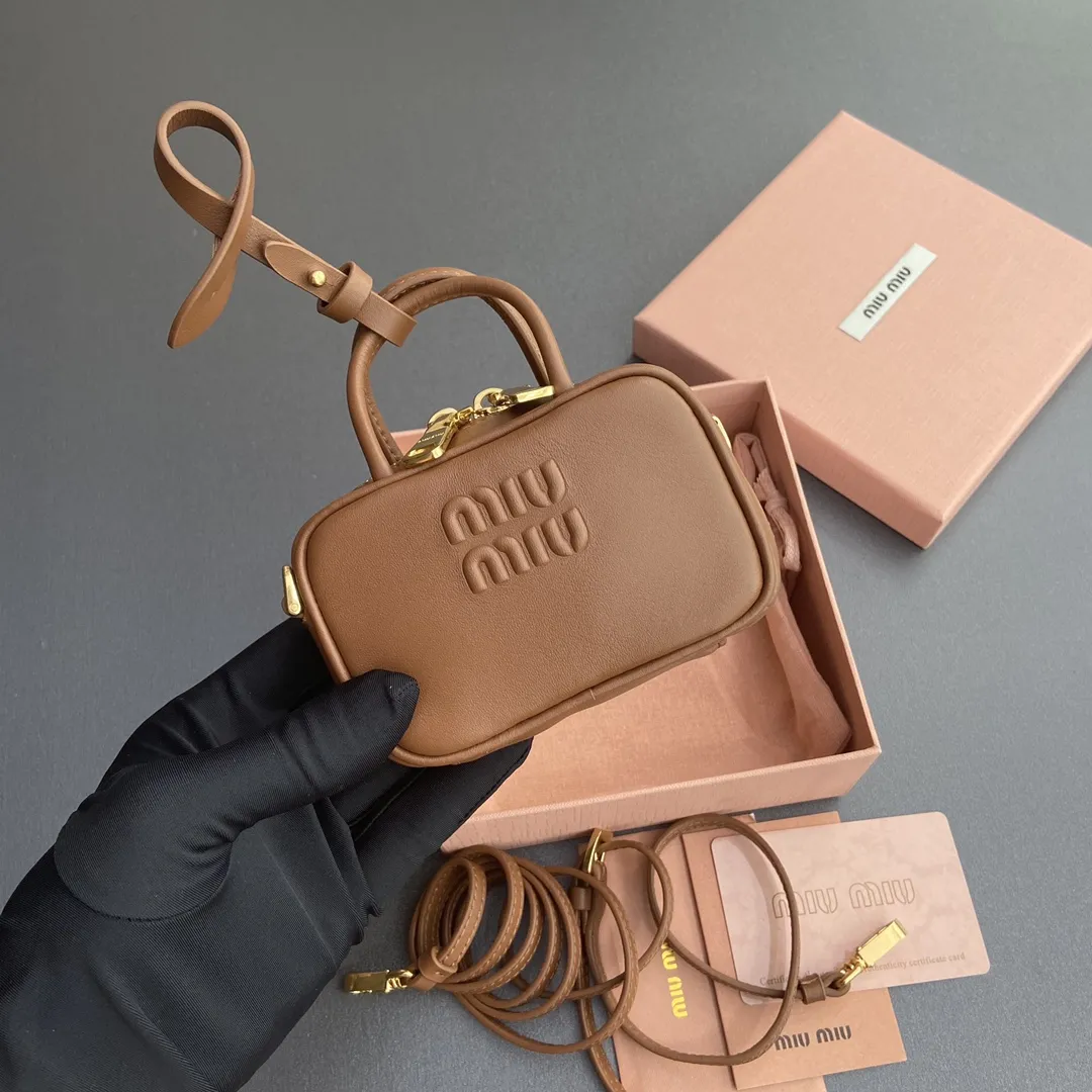 MiuMiu Beau leather micro-bag 5NR036 - Image 7